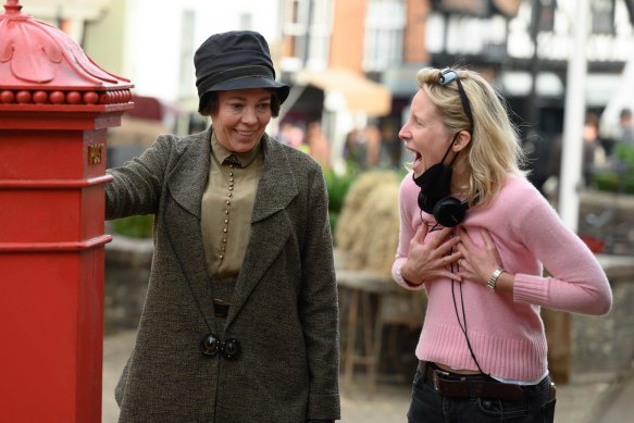 Colman with director Thea Sharrock on the set of Wicked Little Letters. 