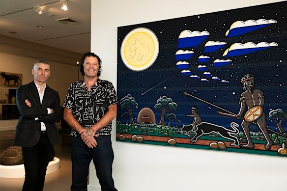 Toby Chapman and artist Blak Douglas with the work he provided for the exhibition.