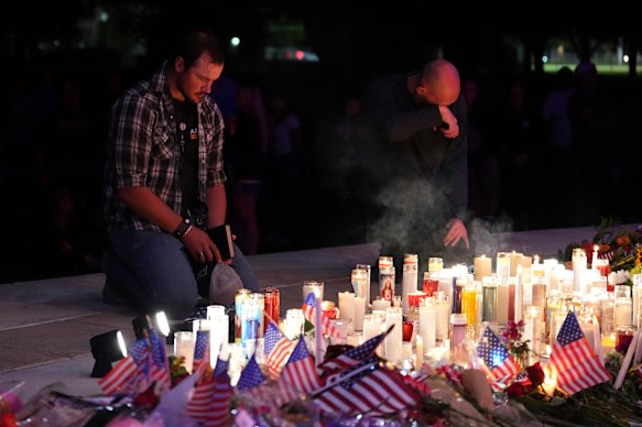 People at a vigil for Kirk in Orem, Utah.
