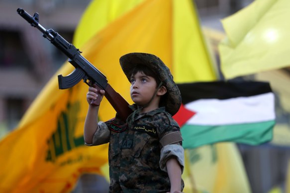 A young boy among supporters of Hezbollah gathered in Beirut to hear Hassan Nasrallah’s speech on Friday.