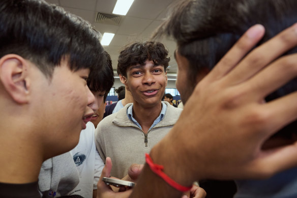 Prefect Tharun Bandara celebrates his HSC results at North Sydney Boys High School on Wednesday.