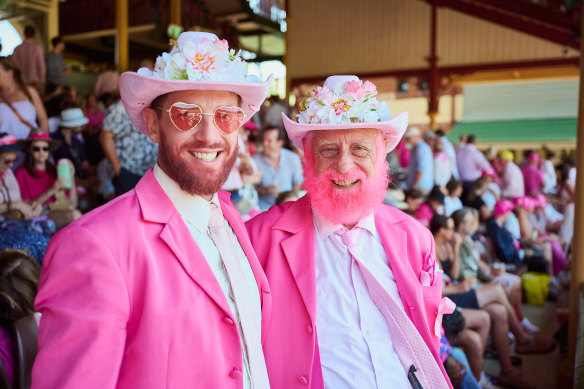 Matthew Knapman and Richard Collins in their pink suits. 