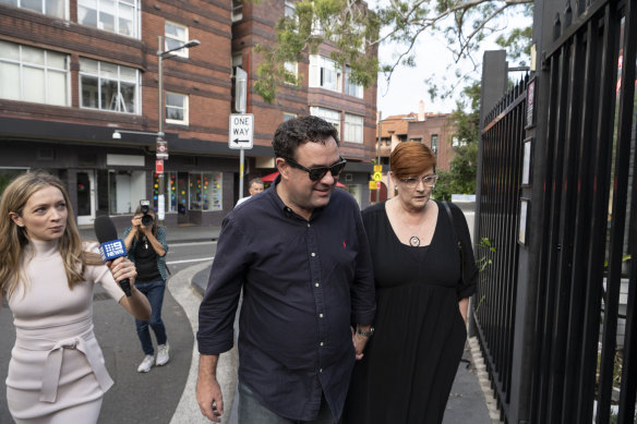 Stuart Ayres and Marise Payne arrive at a Liberal drinks function after the NSW election.