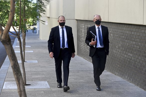 Neville Power and his lawyer Sam Vandongen SC arrive at Perth Magistrates Court on Wednesday.
