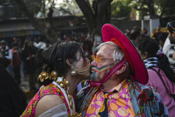 Members of the LGBTQ community kiss during a march demanding equal marriage rights in New Delhi, India, in January.