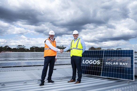 LOGOS CEO Darren Searle (left) and James Doyle (right), Investment Director Solar Bay, on the solar panels at Moorebank Logistics Park in south-west Sydney