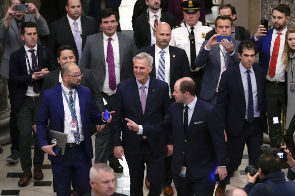 Kevin McCarthy walks to his office from the chamber after a contentious battle to lead the GOP majority in the 118th Congress.