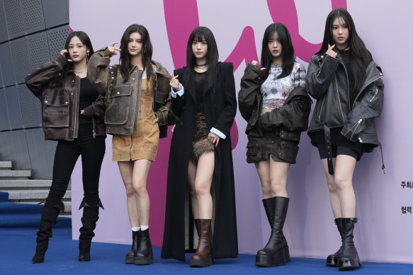 The turmoil between NewJeans and its record label has deepened, with former member Danielle Marsh (second from left) sued by the agency.