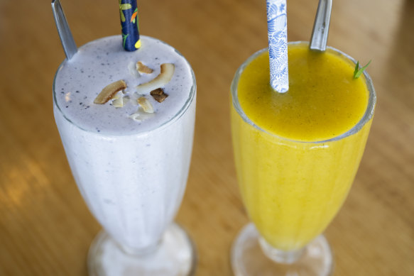 Ken Henry has the  “berry power” smoothie with blueberries, banana, coconut and milk and I have one with mango, mint and coconut water.