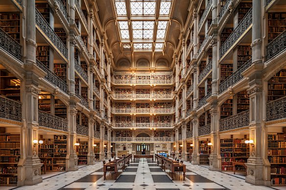 The Peabody Stack Room is a great sky-lit atrium constructed around five tiers of cast-iron balconies.