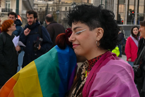 Supporters of the bill waited for the vote results outside the Greek parliament.