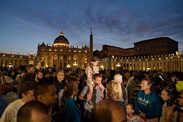 Crowds gather at St Peter’s Basilica in Vatican City following the announcement of Pope Francis’ death.