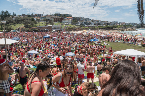 Revellers at Bronte before the afternoon storms.