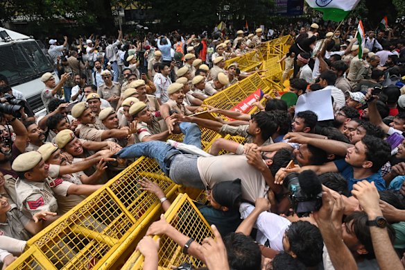 Supporters of the Cockroach Janta Party scuffling with police last week.