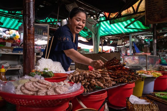 Preparing bun at Dong Ba Market, Hue, Vietnam.