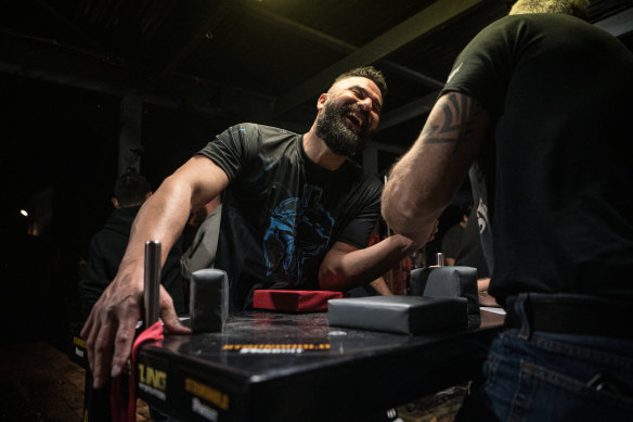 Sydney Spartans Armwrestling Club founder Oz Caglar hosts weekly training sessions the backyard of his home in North Rocks.