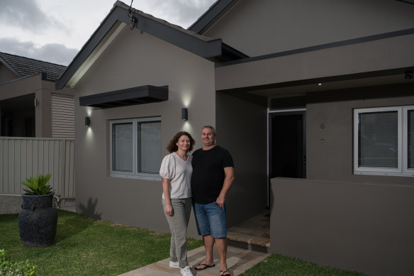 Monica and George Triantafyllou outside their Earlwood home that is currently on the market with a guide of $2.3 million.
