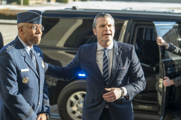 Secretary of defence and former Fox News host Pete Hegseth arriving at the Pentagon for his first day.