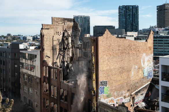 The building after the fire, as demolition began.