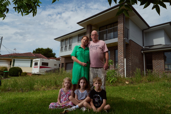 Darren and Donna Ayres with children Summer, Ruby and Dylan at their home in Ryde.