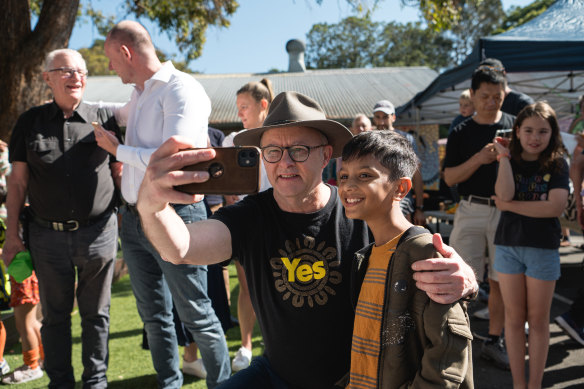 Prime Minister Anthony Albanese takes a selfie at Balmain Public School on referendum day.