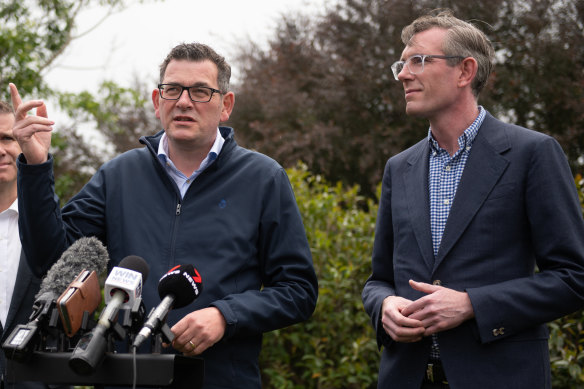 Victorian Premier Daniel Andrews and NSW counterpart Dominic Perrottet (right). The Andrews government will not commit to a “Right to Ask” scheme similar to that being trialled in NSW.