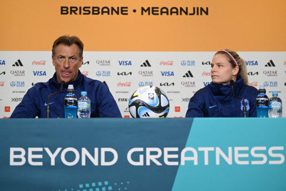 Herve Renard and French star Eugenie Le Sommer front the media on Friday.
