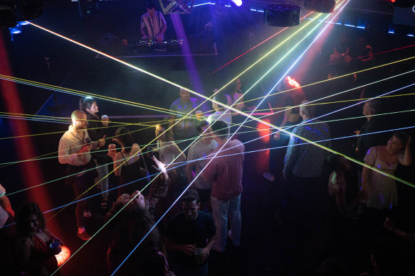 People on the dancefloor at ARQ nightclub.