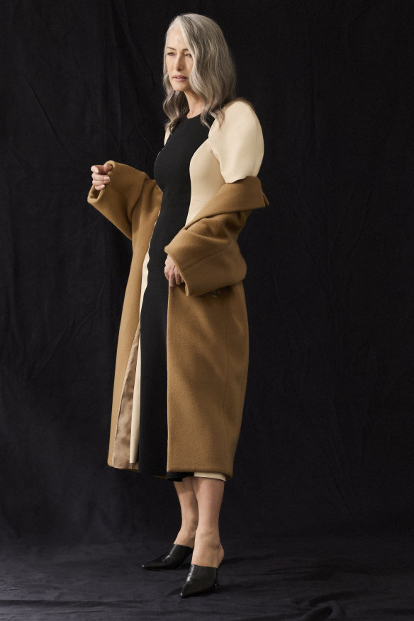 Bianca Spender “Essence” coat, $995, and black leatherette “Flaneur”dress, $745.
Alias Mae black mules, $229.95.