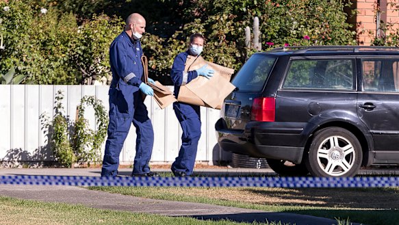 Police at the scene in Sunshine North on Saturday.