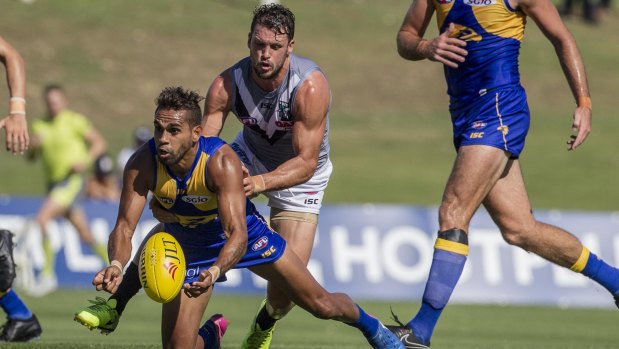 Going to ground: Eagles' Lewis Jetta attempts to hand off under pressure.