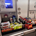 There was so much food loaded onto the flight some had to be stored in the overhead bins.