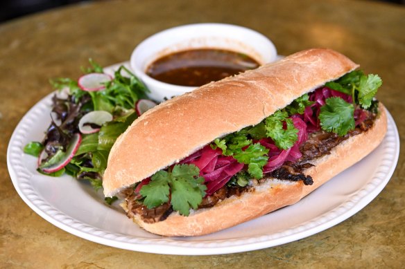 Go-to dish: brisket torta with birria broth for dipping.