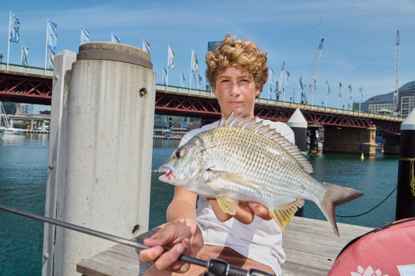 Taylor Rogers, 15, fishing at Darling Harbour on Saturday.