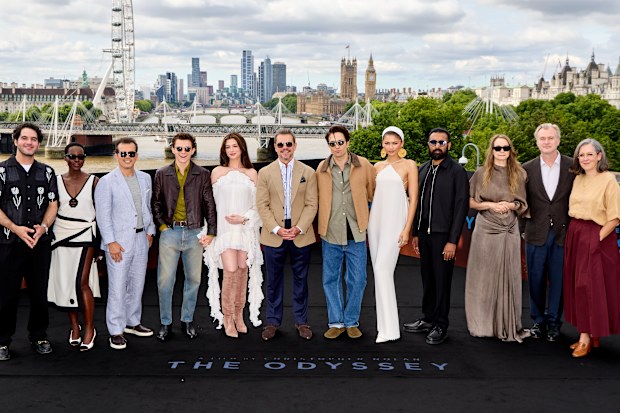The cast for the film is absolutely stacked. (L-R) Benny Safdie, Lupita Nyong’o, John Leguizamo, Tom Holland, Anne Hathaway, Matt Damon, Robert Pattinson, Zendaya, Himesh Patel, Samantha Morton, director Christopher Nolan and producer Emma Thomas 