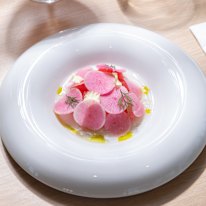 Raw tuna with stracciatella and a fragrant lemon-myrtle dressing.