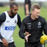 Heritier Lumumba and Nathan Buckley at training in 2014.