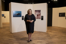 Australian Museum's Director & CEO, Kim McKay, infront of the wildlife photography exhibition at the newly renovated museum, which reopens on Saturday November 28 with free entry. 