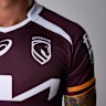 Jesse Arthars models the new Brisbane Broncos jersey for season 2026.