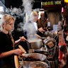 Chai is brewed to order in simmering pots of tea and milk at Ambi’s.