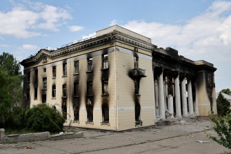 A building scarred by war in Lysychansk, Ukraine. Few residents remain in the city as it undergoes frequent shelling from Russian troops.