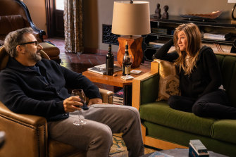 Mitch Kessler (Steve Carell) and Alex Levy (Jennifer Aniston) enjoy a drink in his “Italian” retreat.