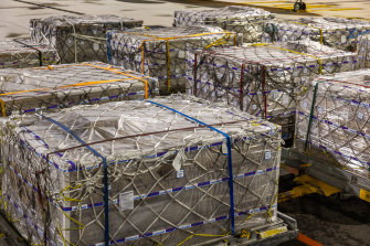 Pallets of Bubs baby formula sit ready for loading onto a cargo plane at Melbourne Airport last month.