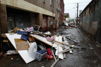 Debris sits piled up outside businesses affected by the floods in Lismore in March 2022.