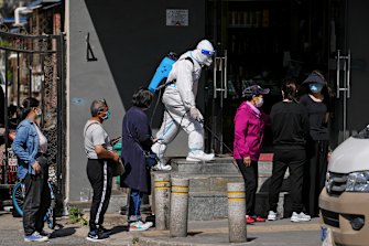 Schools have closed in Beijing and mass-testing has begun. 