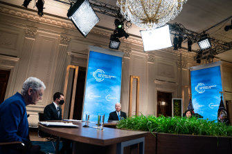 US President Joe Biden, centre, speaks during the virtual Leaders Summit on Climate in the East Room of the White House in Washington, DC. 