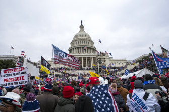 Rioters loyal to then president Donald Trump rally at the US Capitol on January 6, 2021.