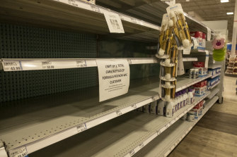 A sign notifies customers of a purchase limit on baby formula amid a national shortage at a grocery store in Detroit, Michigan.