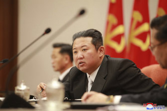 North Korean leader Kim Jong-un addresses a meeting of the Central Committee on December 17 in this government-provided photo. 