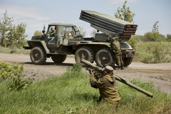A Donetsk People's Republic militia serviceman prepares to fire with a man-portable air defense system at a position not far from Panteleimonivka, in territory under the Donetsk People's Republic government, in eastern Ukraine, on Saturday. .